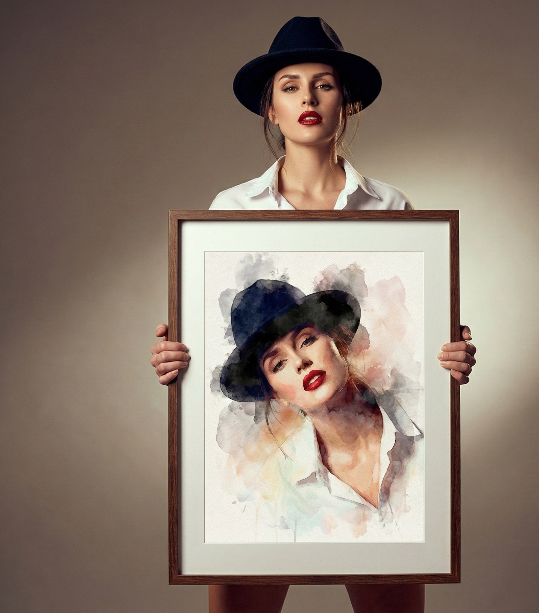 A stylish studio portrait of a woman in a black fedora and white shirt holding a wooden frame containing a loose, expressive watercolor portrait of herself. Minimalist editorial fashion aesthetics with cinematic studio lighting and shallow depth of field.